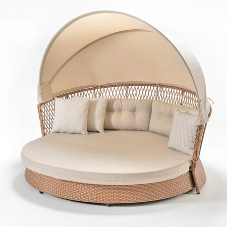 Beige outdoor daybed with canopy on a white background
