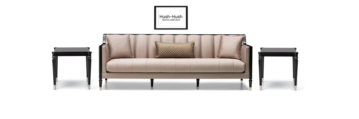 Hush Hush wall frame and  contemporary champagne Sofa and a pair of piano black detailed side coffee tables with brass leg footers