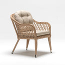 Resin wicker armchair with beige Olefin cushion, handwoven in rattan style on white background – Trendgoat outdoor collection