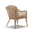 Resin wicker armchair with beige Olefin cushion, handwoven in rattan style on white background – Trendgoat outdoor collection
