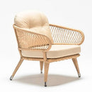 Bay resin wicker garden chesterfield armchair with plush waterproof cushion in beige Olefin fabric on white background – by Trendgoat