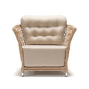 Wide garden armchair in resin wicker rattan style with plush Olefin cushion on white background – part of Begonia Collection by Trendgoat