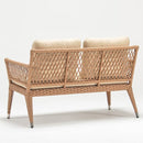Rattan-style resin wicker two-seater sofa with Olefin cushion in beige part of Trendgoat Camellia set