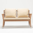 Rattan-style resin wicker two-seater sofa with Olefin cushion in beige part of Trendgoat Camellia set