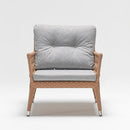 Handwoven rattan-effect resin wicker garden armchair with back and seat cushion – part of Camellia set by Trendgoat