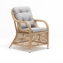 High-back resin wicker garden armchair with beige Olefin cushion and rattan-style weave – Coral Collection by Trendgoat