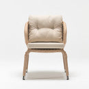 Trendgoat Gardenia armchair crafted with handwoven resin wicker in close-weave and lattice-effect patterns, supported by a rust-proof aluminum frame and finished with a plush beige Olefin cushion offering UV, flame, and water resistance.