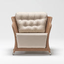 Trendgoat Henley rattan chesterfield garden armchair with high backrest, handwoven resin wicker frame, and beige flame-retardant cushion in 100% Olefin fabric