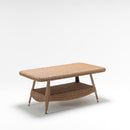 Trendgoat Henley rectangular outdoor garden table with tempered glass top and integrated rattan shelf; crafted from handwoven resin wicker on a powder-coated aluminum frame