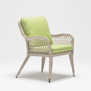 Trendgoat Iris resin wicker armchair with minimalist high-back design, beige cushion, and rust-free aluminum frame