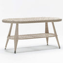 Trendgoat Jonquil rattan garden patio tables with built in shelve in three sizes with tempered glass tops, handwoven resin wicker, and powder-coated aluminum frames.