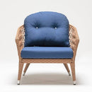Single rattan armchair from Judas Plus collection, featuring ergonomic design and weather-resistant Olefin cushion