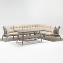 Lilly 7-seater rattan corner sofa set with high-back sectional sofa and glass-top coffee table arranged on a patio