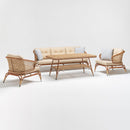 Traditional rattan-style 5-seater garden lounge set with sofa, two armchairs, and glass-top coffee table arranged outdoors