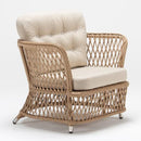 Curved-back armchair in traditional handwoven resin wicker with weather-resistant cushion – Novara garden set