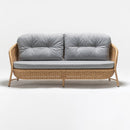 Large three-seater light brown rattan garden sofa with gray plush Olefin cushions by Trendgoat. part of Oleander Plus Collection