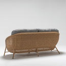 Large three-seater light brown rattan garden sofa with gray plush Olefin cushions by Trendgoat. part of Oleander Plus Collection back image