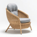 High-back resin wicker armchair with weatherproof cushion – elegant garden lounge seating from TrendGoat
