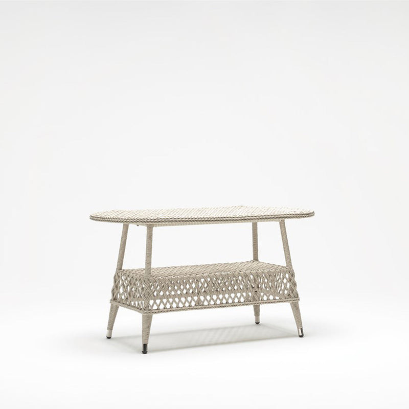 Off White Oval rattan-style outdoor table with tempered glass top and lower shelve – handwoven resin wicker by TrendGoat