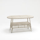 Off White Oval rattan-style outdoor table with tempered glass top and lower shelve – handwoven resin wicker by TrendGoat