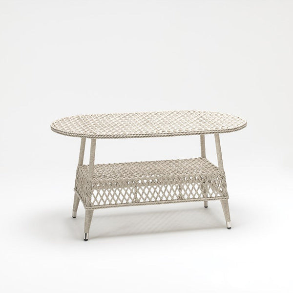 Off White Oval rattan-style outdoor table with tempered glass top and lower shelve – handwoven resin wicker by TrendGoat