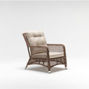 High-back armchair in resin wicker with weatherproof cushion – part of Palm garden set by TrendGoat