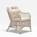 Compact outdoor armchair in handwoven resin wicker with Olefin cushion – Poppy garden set by TrendGoat