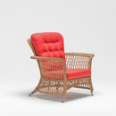 High-back resin wicker armchair with waterproof cushion – part of Rosa Lounging Set by TrendGoat