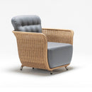 Curved-back armchair in traditional handwoven resin wicker with weather-resistant cushion – Safron garden set